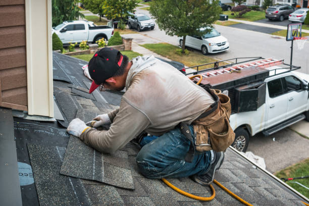 Professional Gutter Repair And Installation technician working in Biddeford, ME